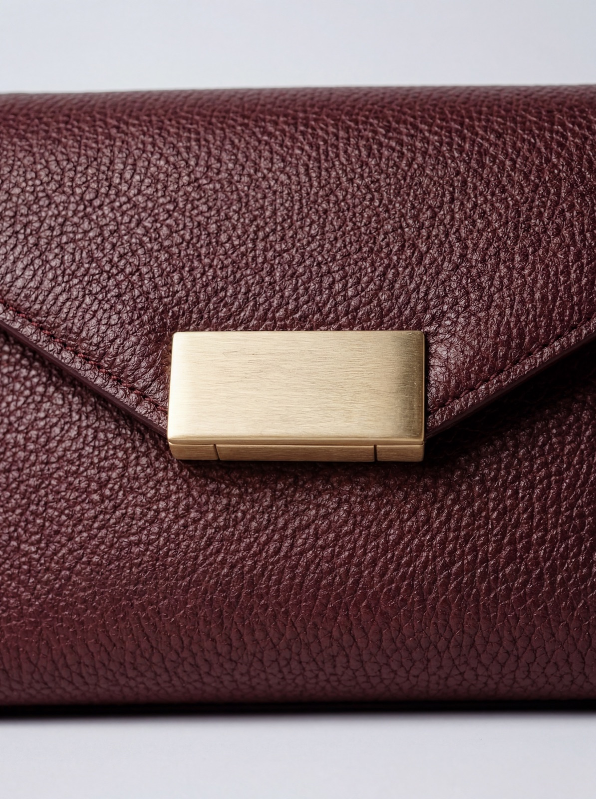 Burgundy bag — texture