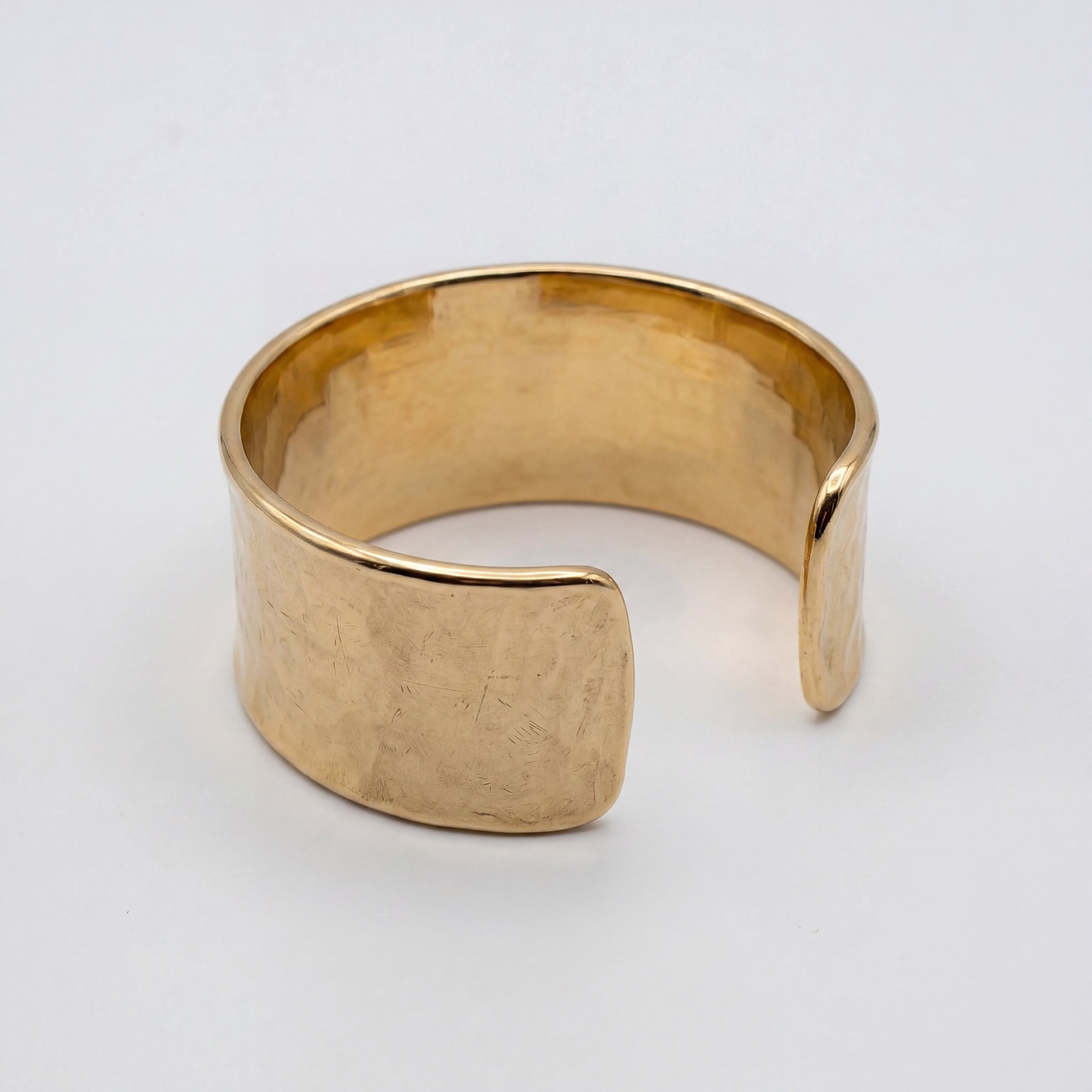 Gold cuff bracelet — top view